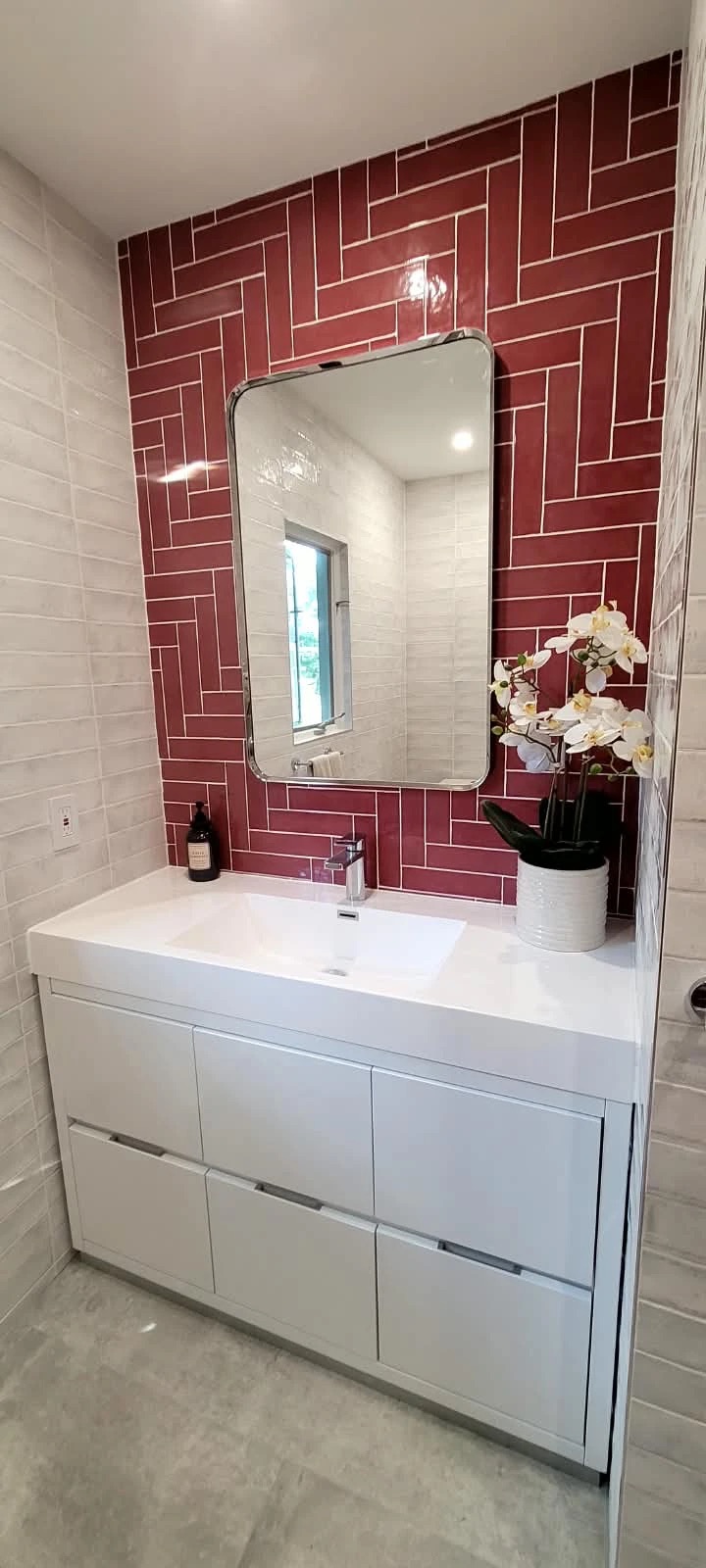 Herringbone tile bathroom, view 2