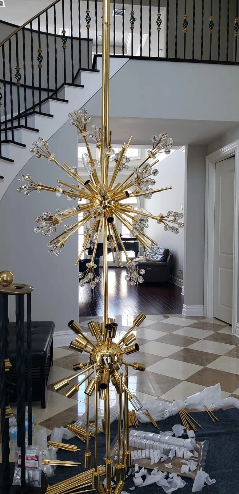 Foyer chandelier install during